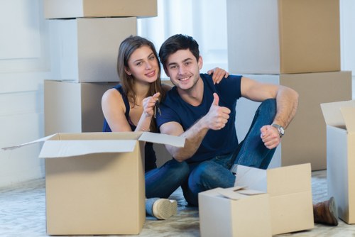 Movers organizing belongings during a home relocation